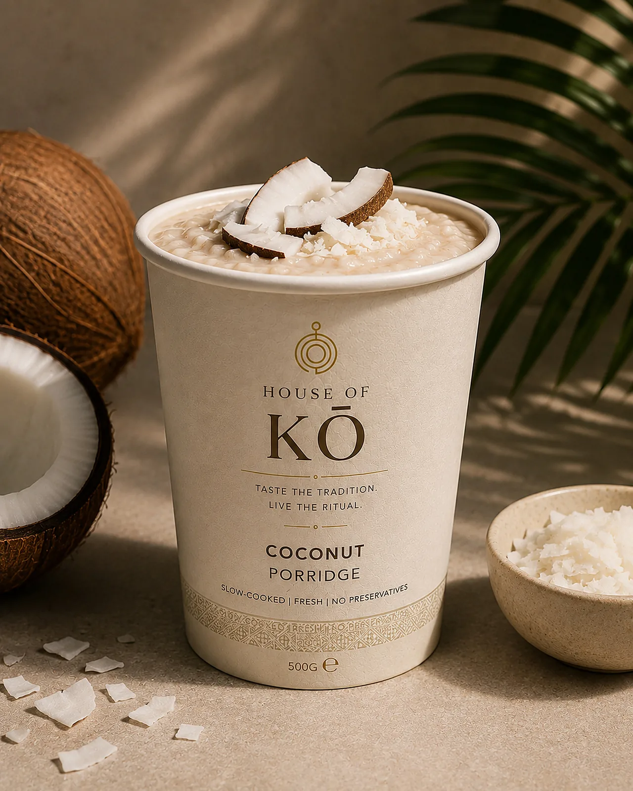 House of KŌ Coconut Porridge cup topped with fresh coconut