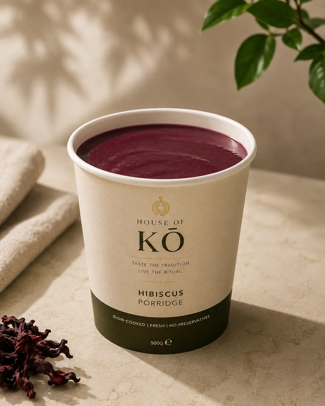 House of KŌ Hibiscus Porridge cup with dried hibiscus petals